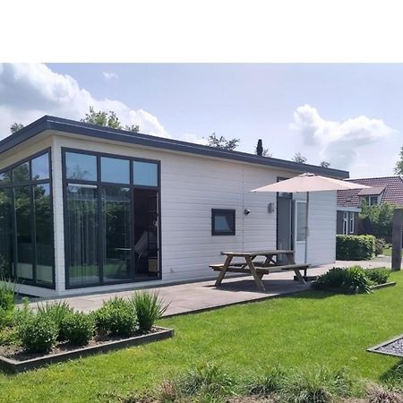 Knus Chalet Heidebloem Putten Buitenkant foto